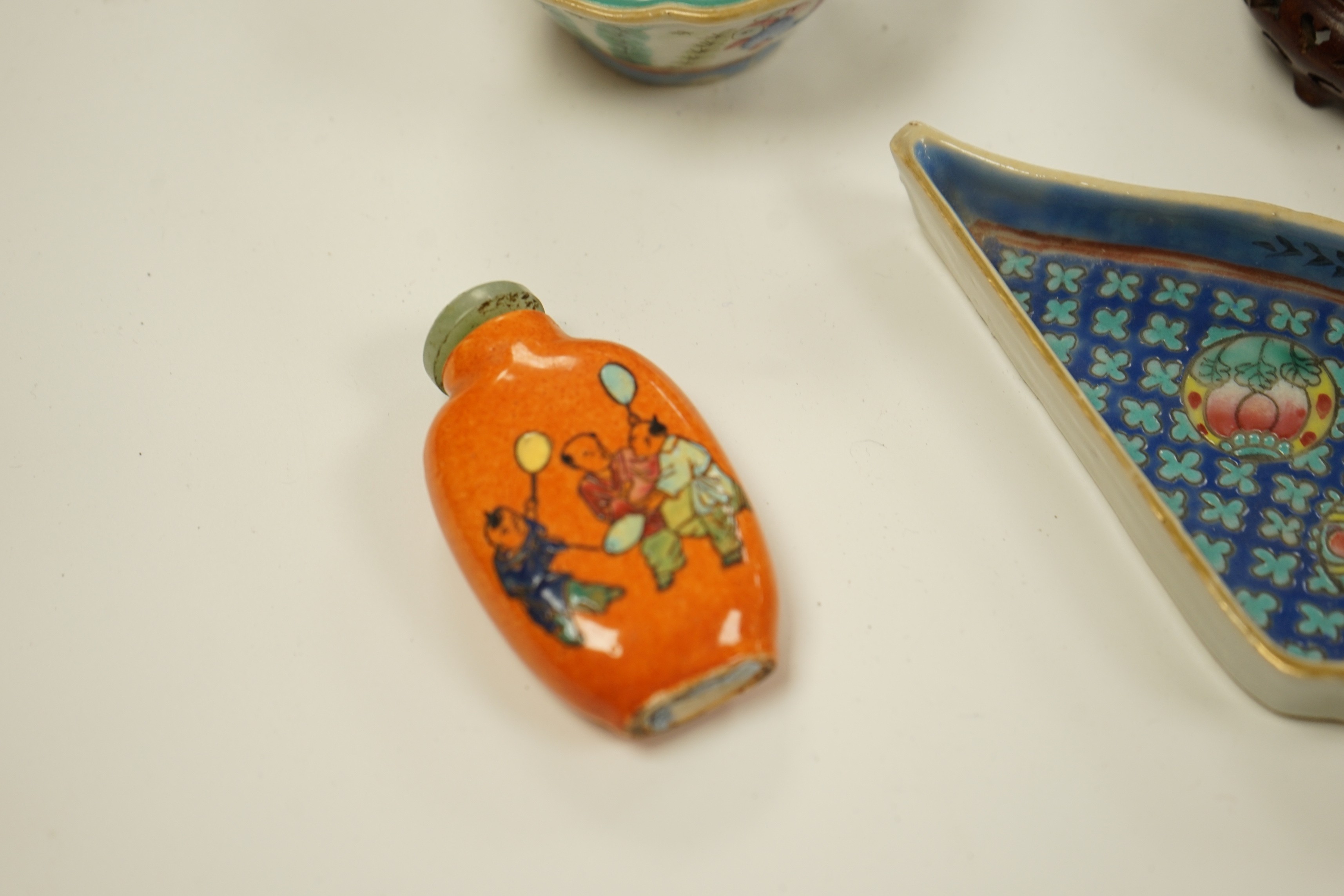 A Chinese famille rose cup, snuff bottle and triangular dish-17cms wide (3)